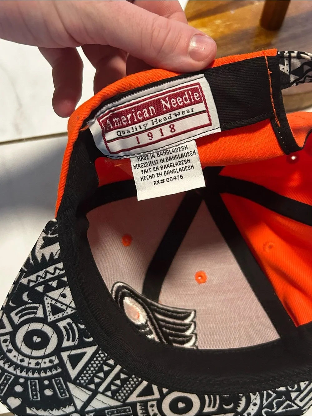 American Needle Orange Snapback Hat with Black Patterned Brim
